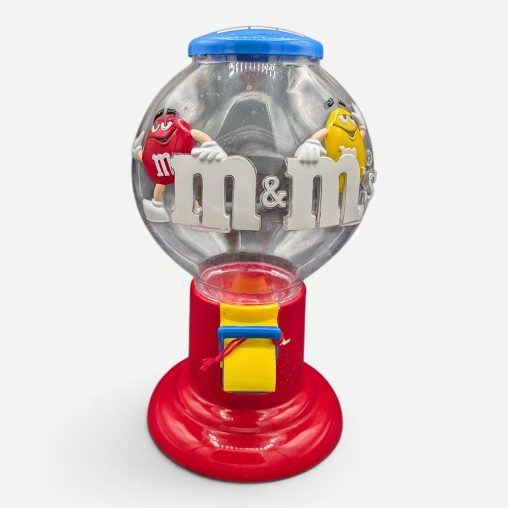M&M'S GUMBALL STYLE PLASTIC GLOBE CANDY DISPENSER WITH RED & YELLOW CHARACTERS